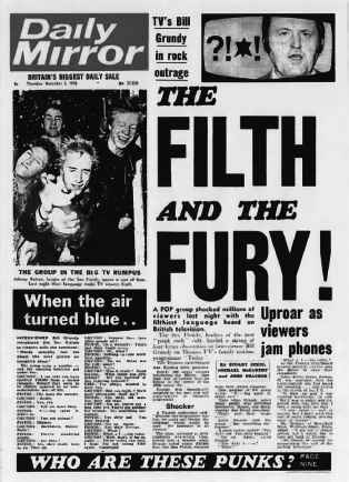 Start of image description, The headline on the front page of the Daily Mirror on Thursday 2 December 1976 declares, The Filth and the Fury, alongside a photo of The Sex Pistols. Lead singer John Lydon is pictured laughing as he explosively opens a can of Carlsberg lager. The whole front page is dominated by the Pistols’ foul-mouthed appearance on Bill Grundy’s teatime show, Today., end of image description