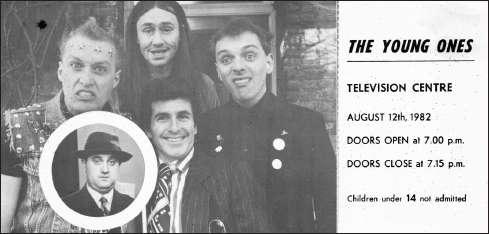 Start of image description, A ticket for the live recording of an episode of The Young Ones at B B C Television Centre on 12 August 1982. The ticket features Adrian, Rik Mayall, Nigel Planer, Christopher Ryan and Alexei Sayle posing as their characters., end of image description
